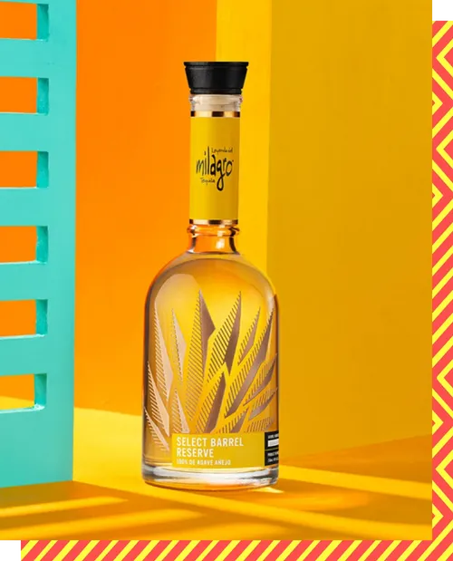 A bottle of Milagro Select Añejo tequila